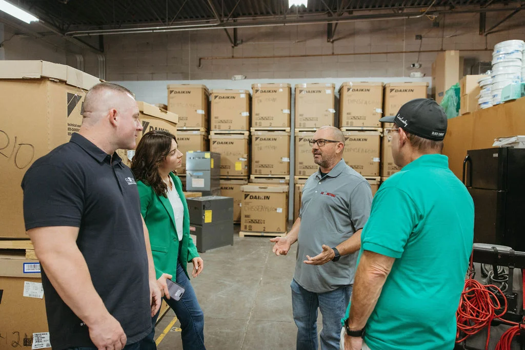 Clover team talking with Pete Roberts