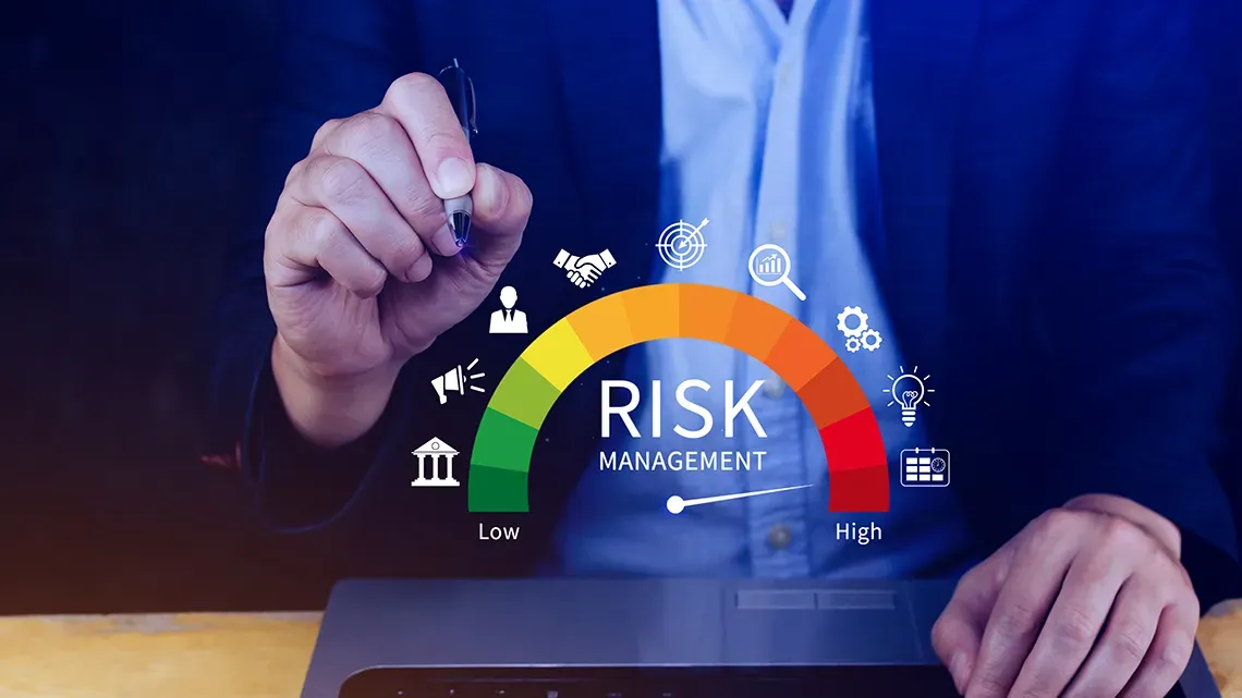 Image of a man reviewing a floating risk management graph